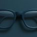 Gafas inteligentes sobre fondo verde petróleo, símbolo de percepción estratégica en entornos digitales BIM"